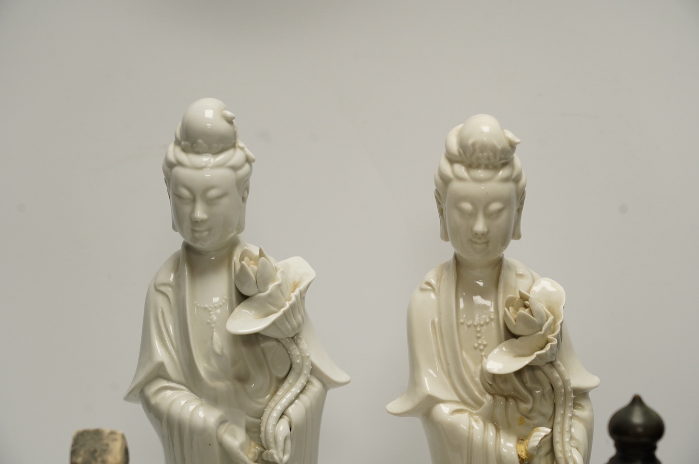 Two Chinese blanc de chine figures, a pottery figure and a metal incense burner, tallest item 35.5cm high. Condition - poor to fair